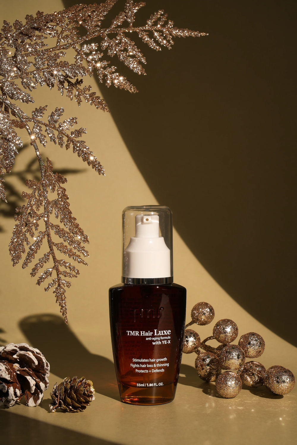 Expertly formulated strengthening hair oil infused with nutrient-rich flaxseed oil and antioxidant-enhanced edible gold to fortify fragile hair and reduce regular breakage and stubborn split ends.